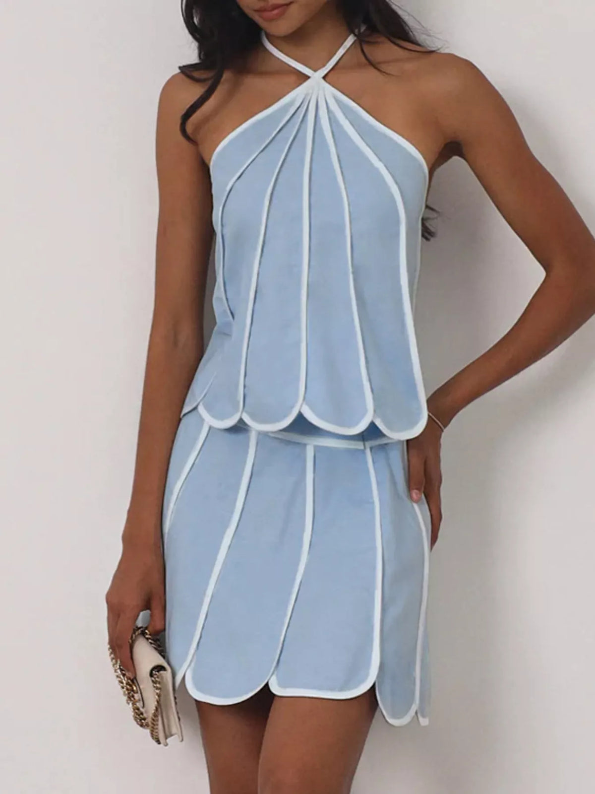Contrast trim halter neck top and matching skirt set by Plush Fashion Hub, stylish women's fashion ensemble with bold accents.