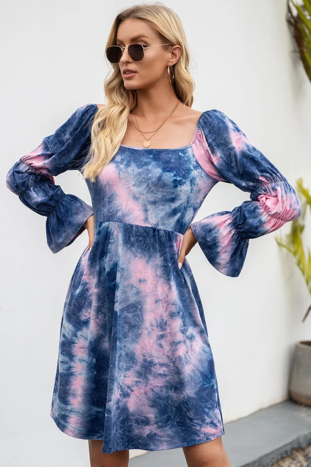 Plush Fashion Hub Ivy Lane tie-dye square neck dress with flounce sleeves, featuring a stylish and vibrant boho-inspired design.