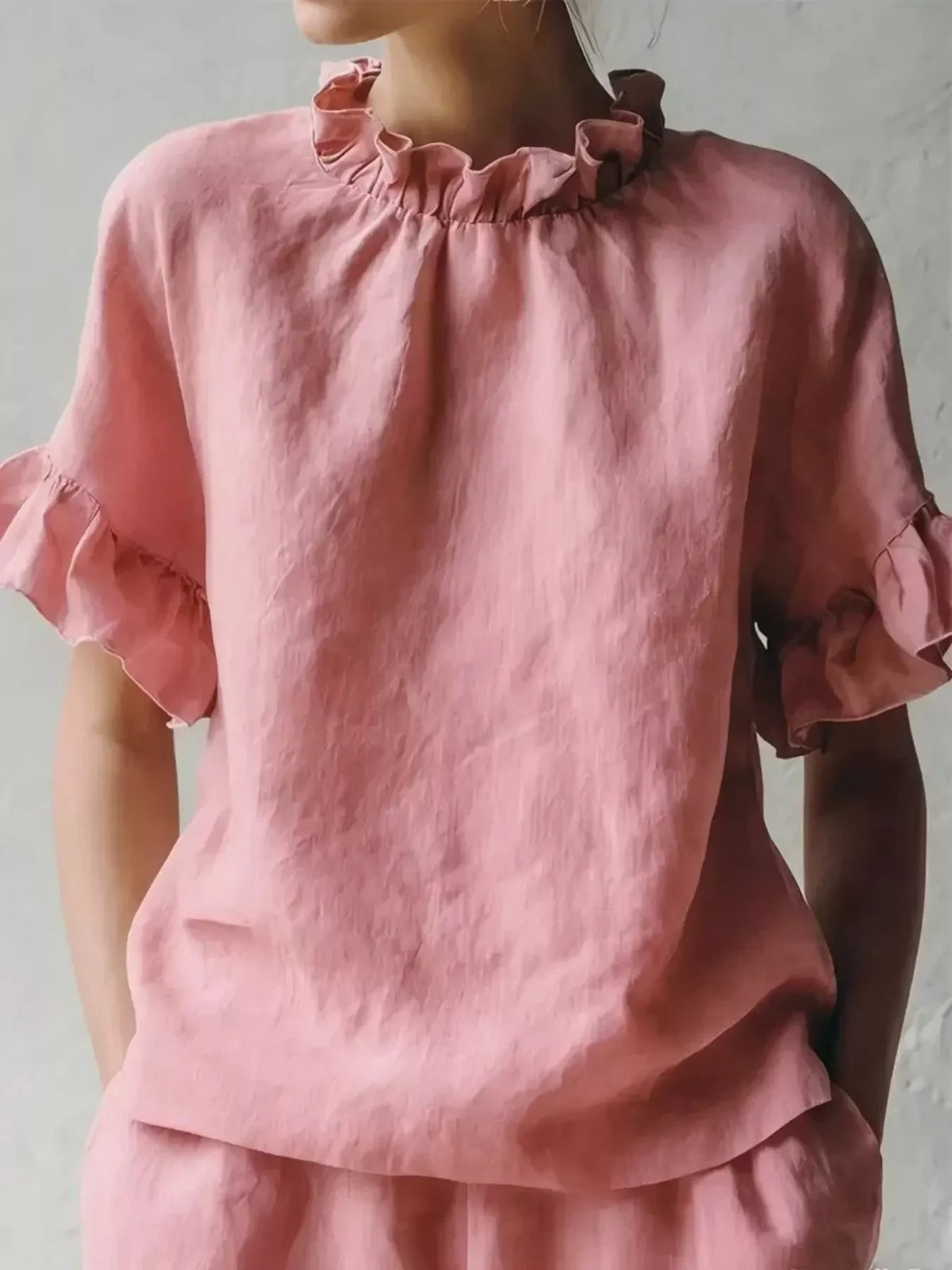 Plus size ruffled neck blouse with half sleeves from Plush Fashion Hub, featuring a full-size fit and stylish ruffle detailing.