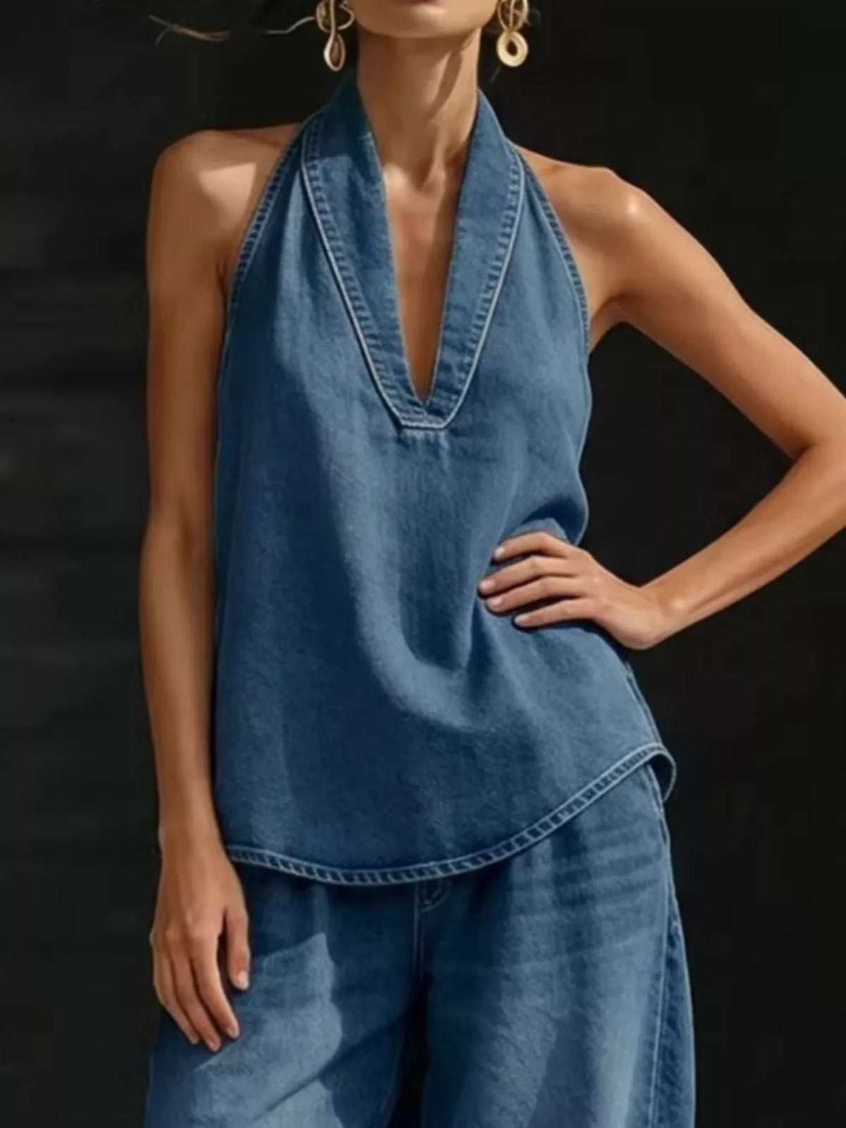 Plus size women's halter neck top and wide-leg pants two-piece set by Plush Fashion Hub, displayed as a stylish dress.