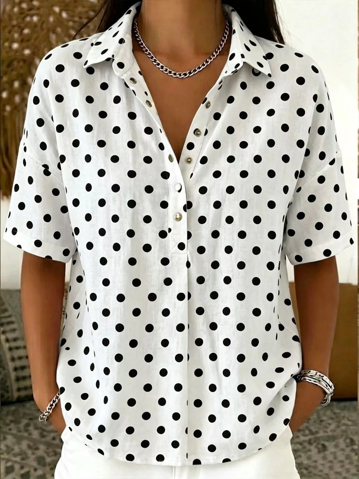 Plus size polka dot short sleeve shirt from Trendsi, featuring a full-size top with a classic polka dot pattern and comfortable fit.
