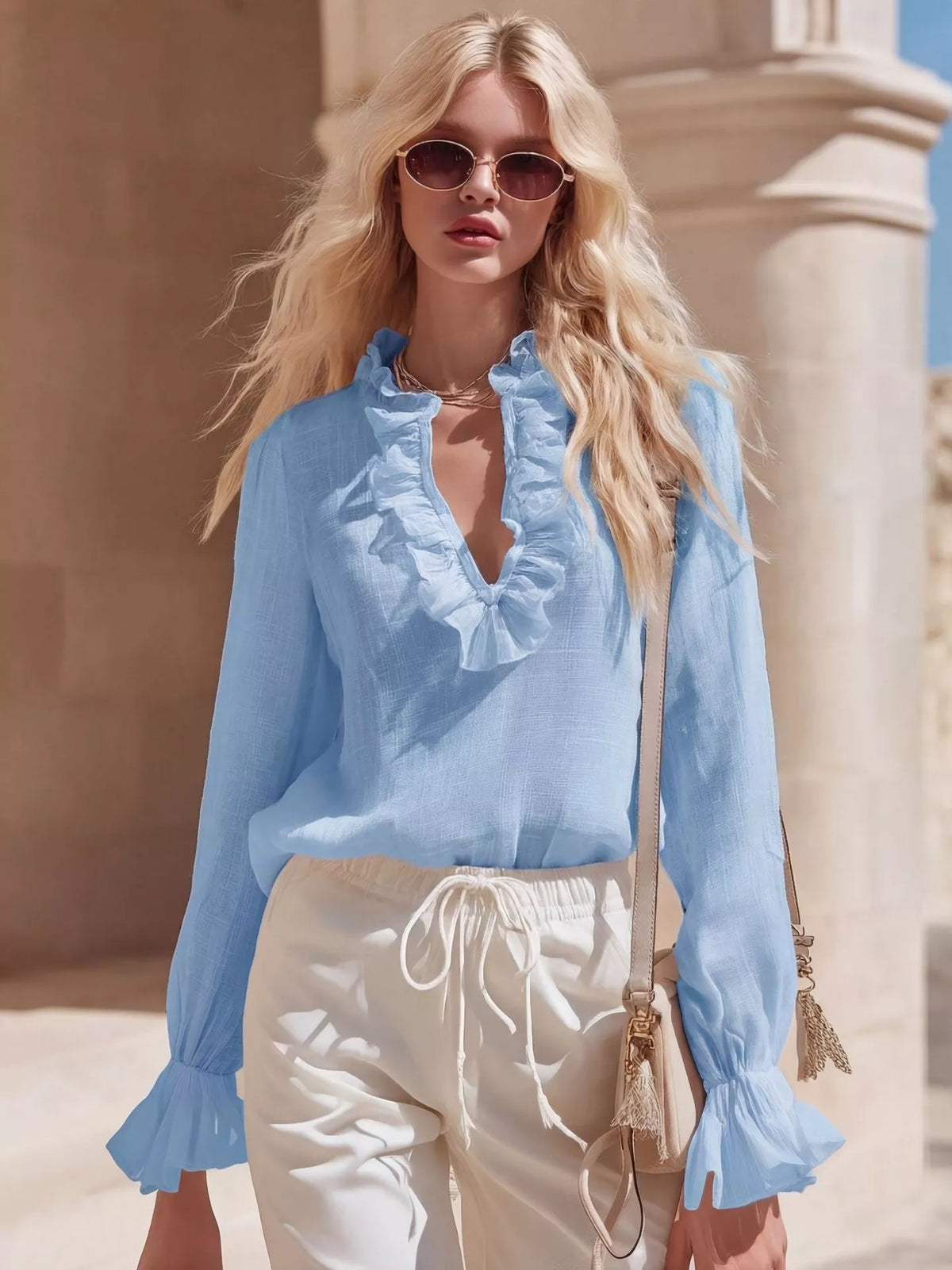 Plush Fashion Hub ruffled V-neck long sleeve blouse with feminine ruffle details and soft fabric, perfect for stylish casual wear.