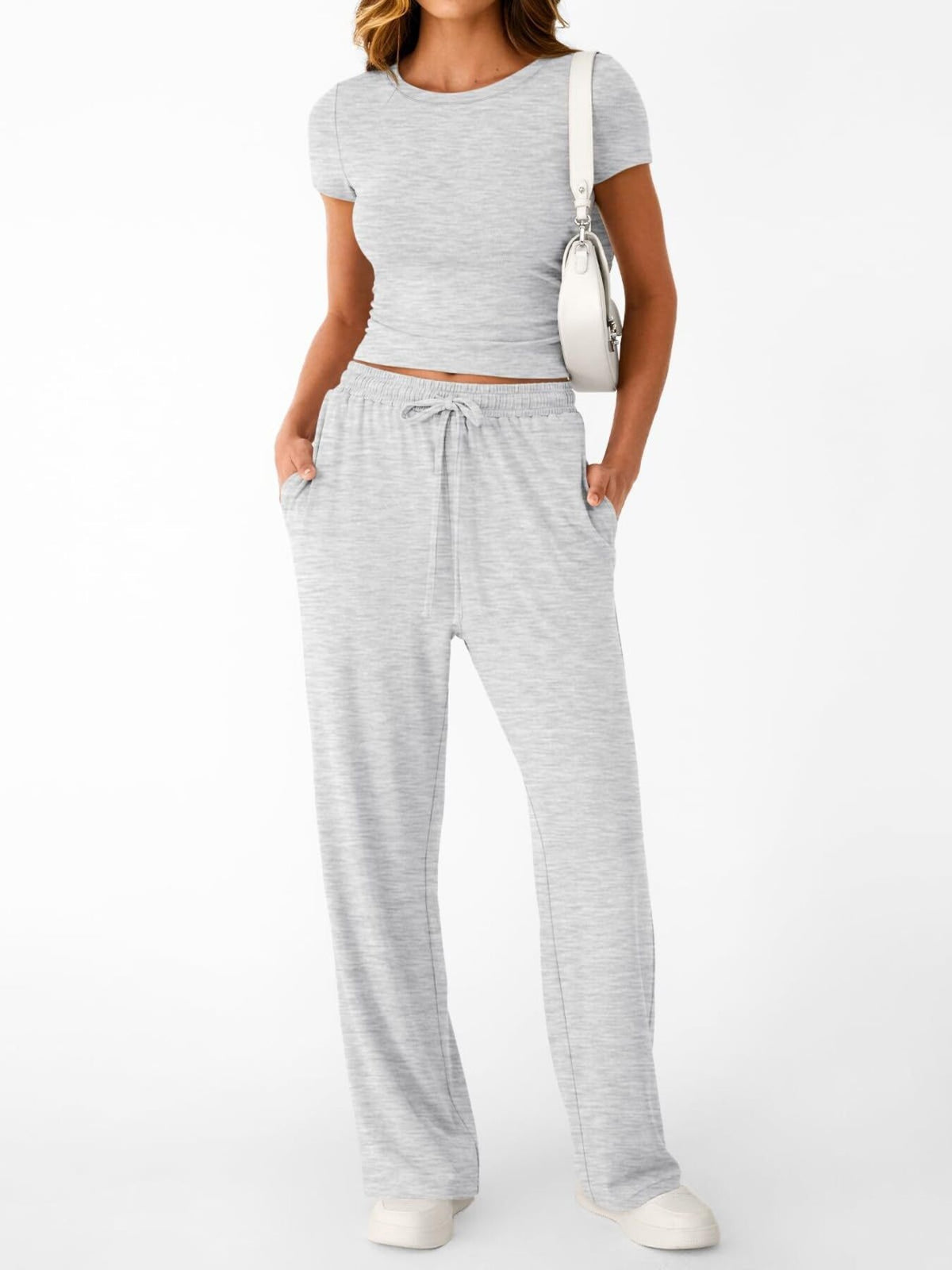 Women's round neck short sleeve T-shirt and drawstring lounge set by Plush Fashion Hub, showing the comfortable two-piece outfit.