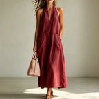 Cotton halterneck sleeveless dress with deep V-neck and loose straight-line fit, casualwear by FitiqueFit.