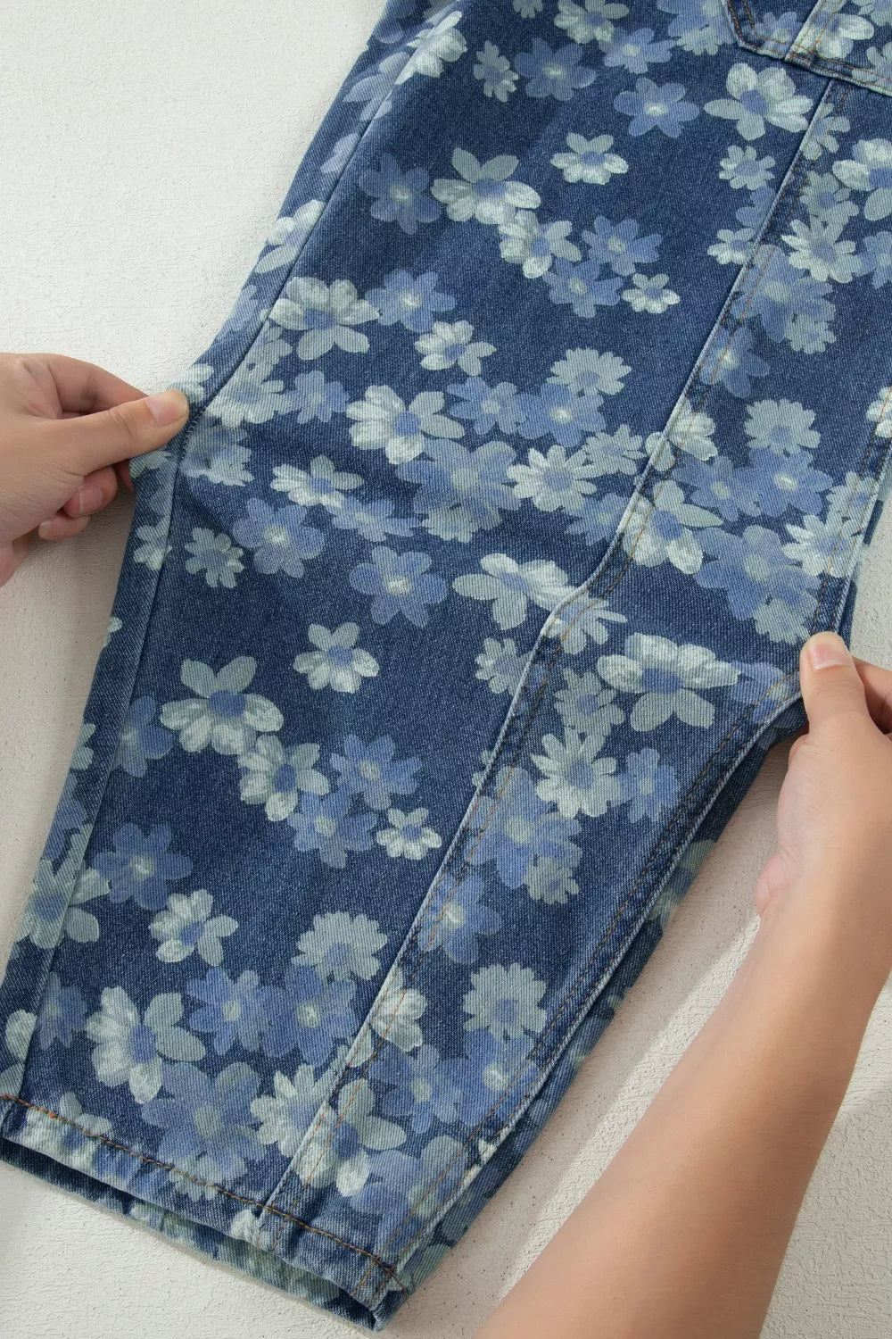 Dainty floral printed drawstring barrel jeans from Plush Fashion Hub, featuring a relaxed fit and floral design in denim fabric.