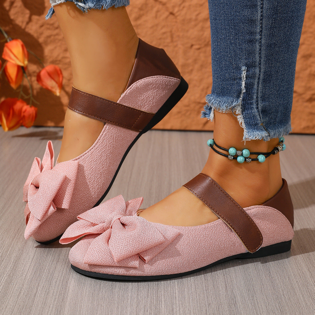 Women's vegan leather slip-on flats with round toe and chic bow from Plush Fashion Hub, comfortable and stylish shoe for everyday wear.