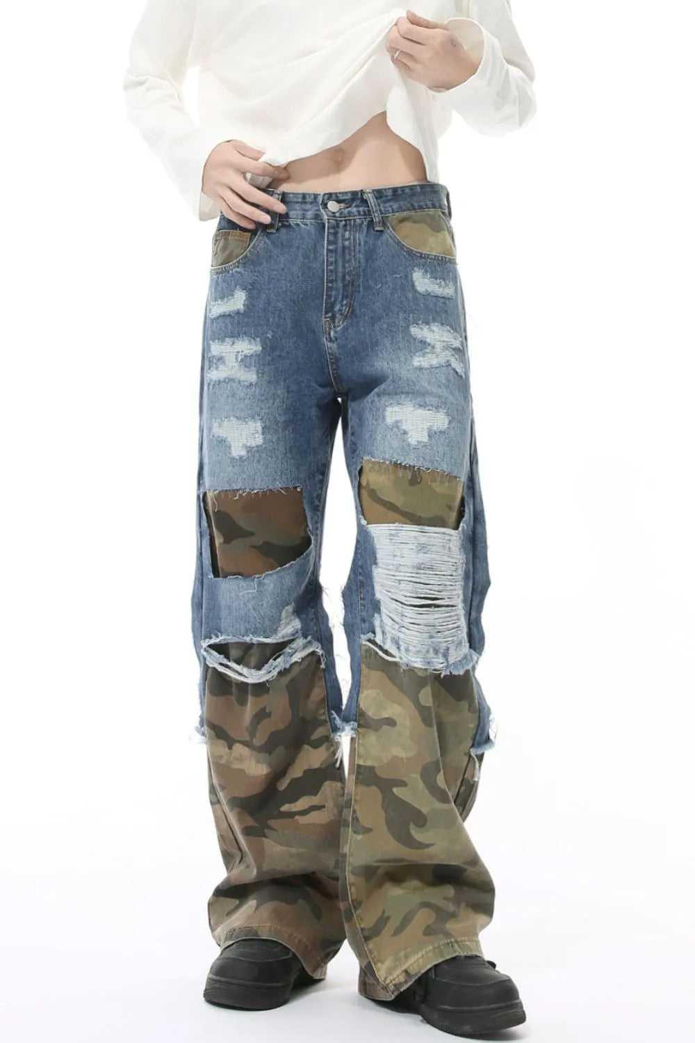 Distressed camouflage patchwork jeans by Plush Fashion Hub showing front view with ripped details and mixed camouflage fabric.