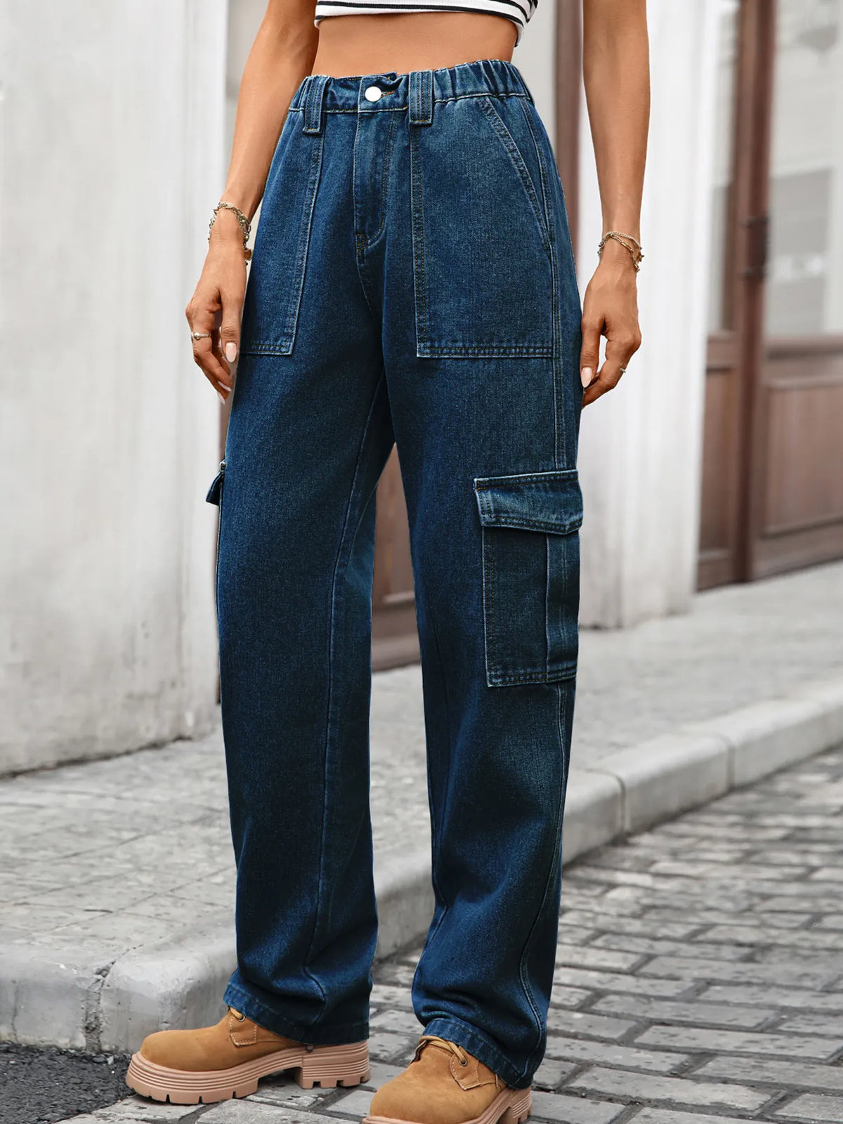 High-waisted cargo denim jeans by Plush Fashion Hub featuring a classic blue denim look and functional side pockets.