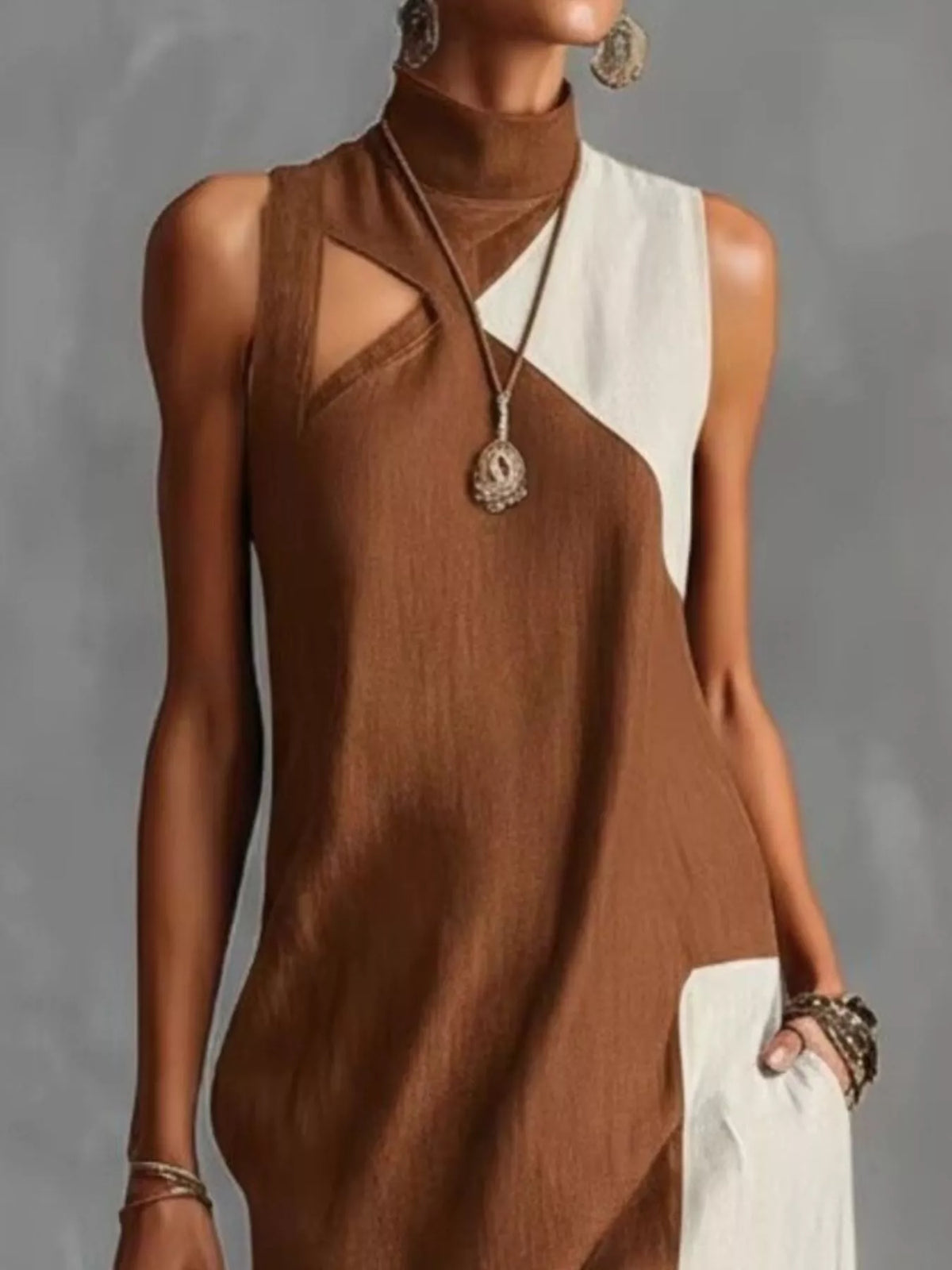 Plus size color block sleeveless maxi dress with mock neck from Plush Fashion Hub, featuring bold color blocking and a flowing silhouette.