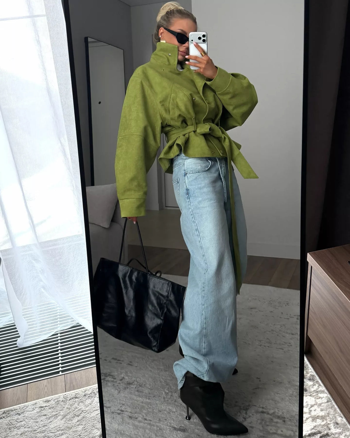 Women's tie waist long sleeve cropped jacket by Trendsi, featuring a stylish design with a fitted waist and button details.
