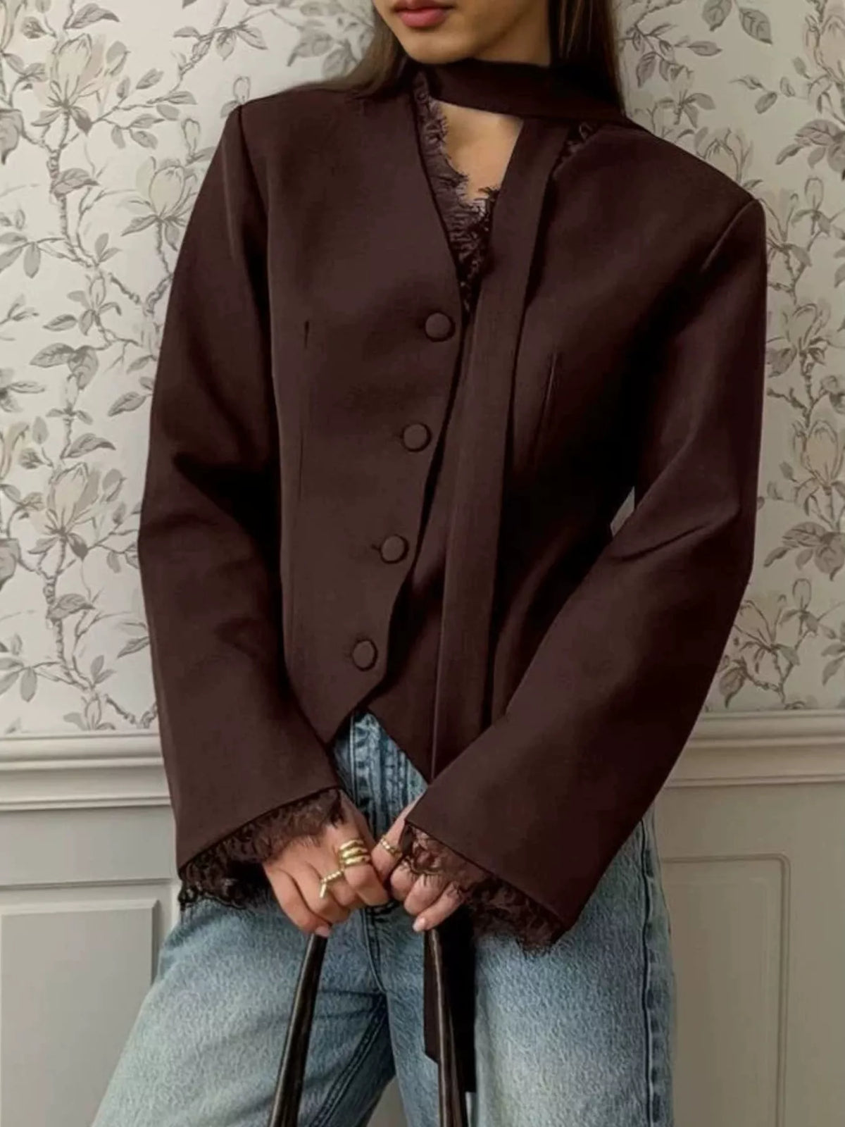 Lace trim button-up blazer from Trendsi featuring a tailored fit and stylish lace details on the collar and cuffs.