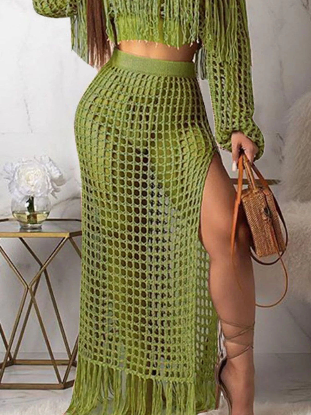Plus size crochet off-shoulder fringe top and skirt set by Plush Fashion Hub, featuring a stylish matching set with intricate crochet details.