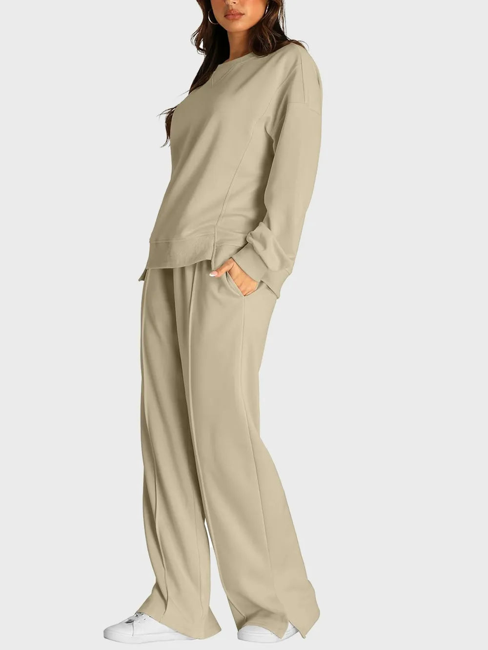Trendsi round neck long sleeve top and slit pants set, stylish matching outfit with a fitted top and flowy slit pants.