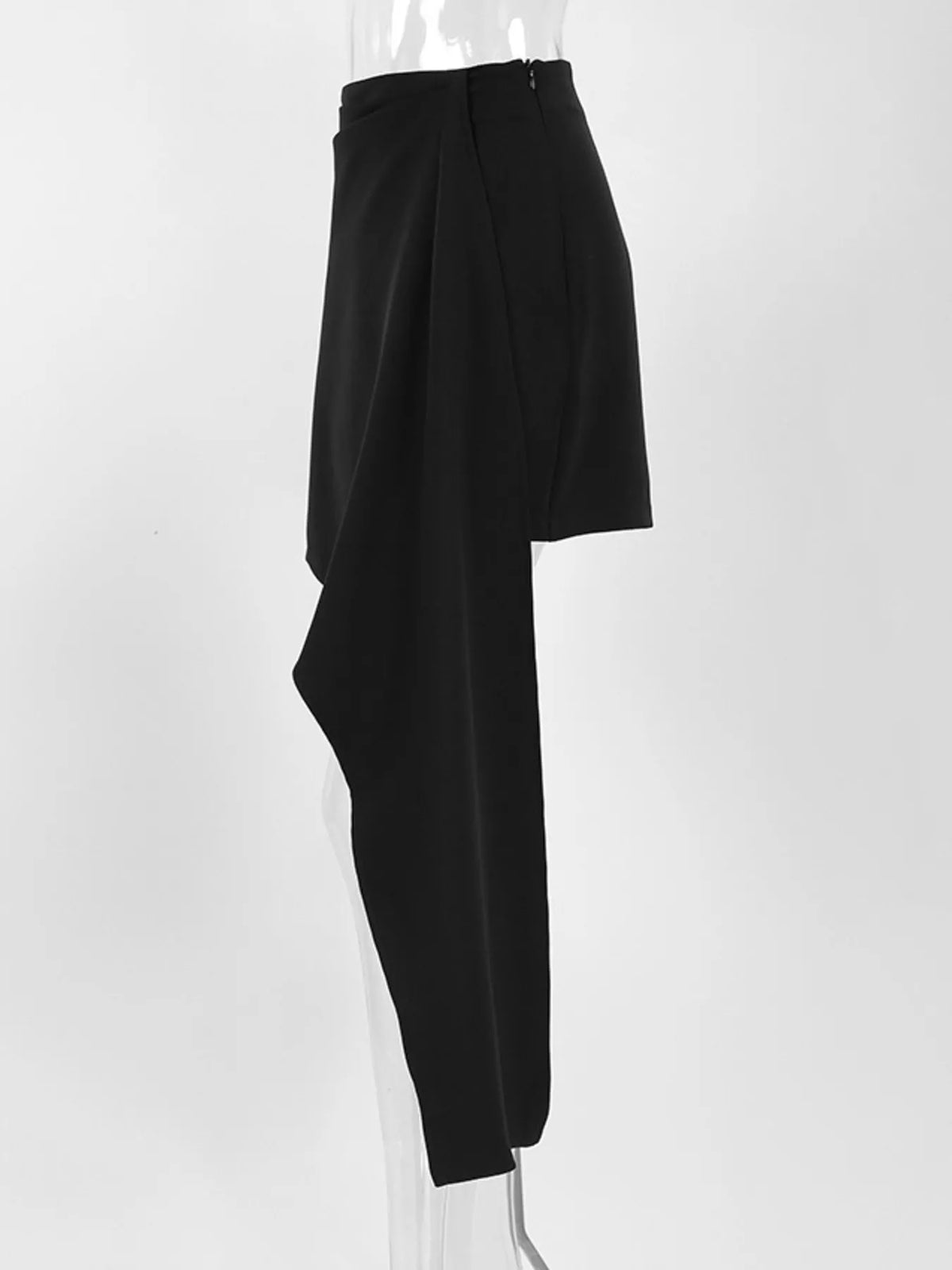 Asymmetric high-waisted draped mini skirt from Trendsi showcasing a stylish, modern design with flowing fabric and a unique silhouette.