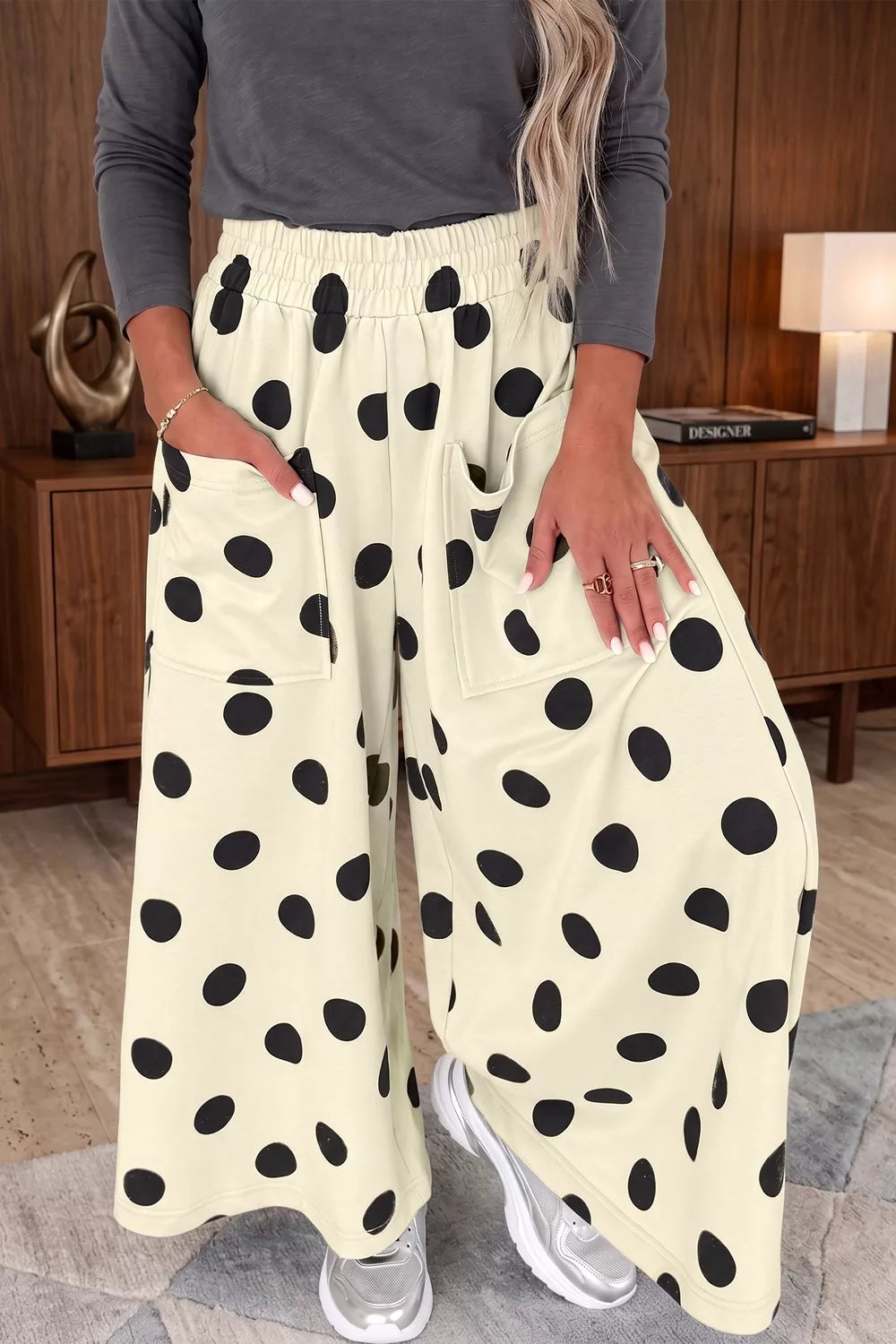 Polka dot wide leg casual pants with elastic waistband from Trendsi, featuring a relaxed fit and stylish pattern.
