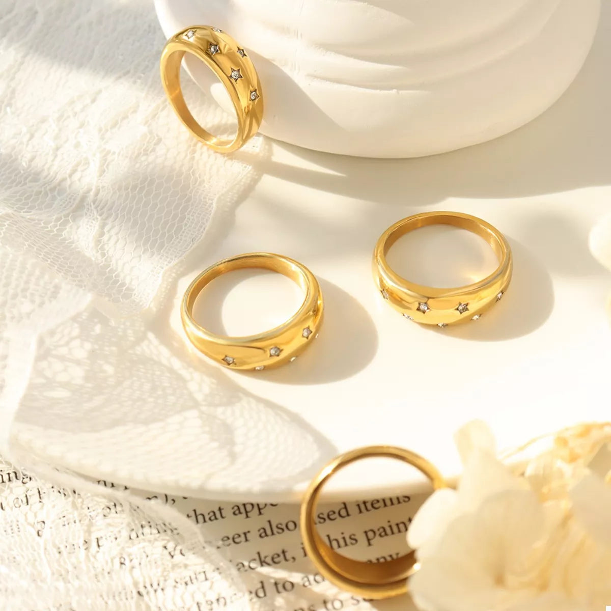 Gold-plated zircon ring from Plush Fashion Hub featuring a sparkling gemstone and elegant design.