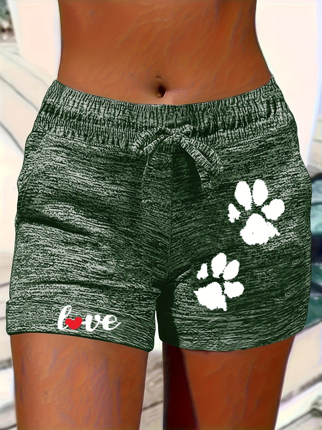Women's printed elastic waist cropped shorts with pockets from Plush Fashion Hub, casualwear style, shown with a floral print.