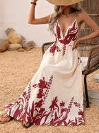 Deep V-neck spaghetti strap evening maxi dress by Trendsi featuring an elegant floor-length gown with a flowy silhouette.