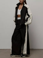 Color block zip-up outerwear and pants set by Trendsi, featuring vibrant color blocking and a comfortable fit.