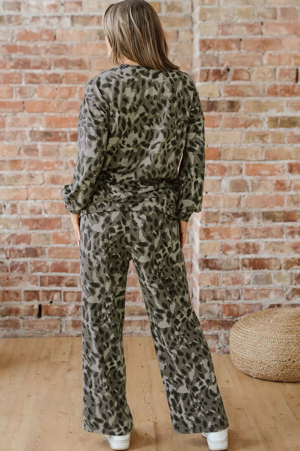 Leopard print long sleeve top and matching pants set from Trendsi, stylish and comfortable animal print fashion ensemble.