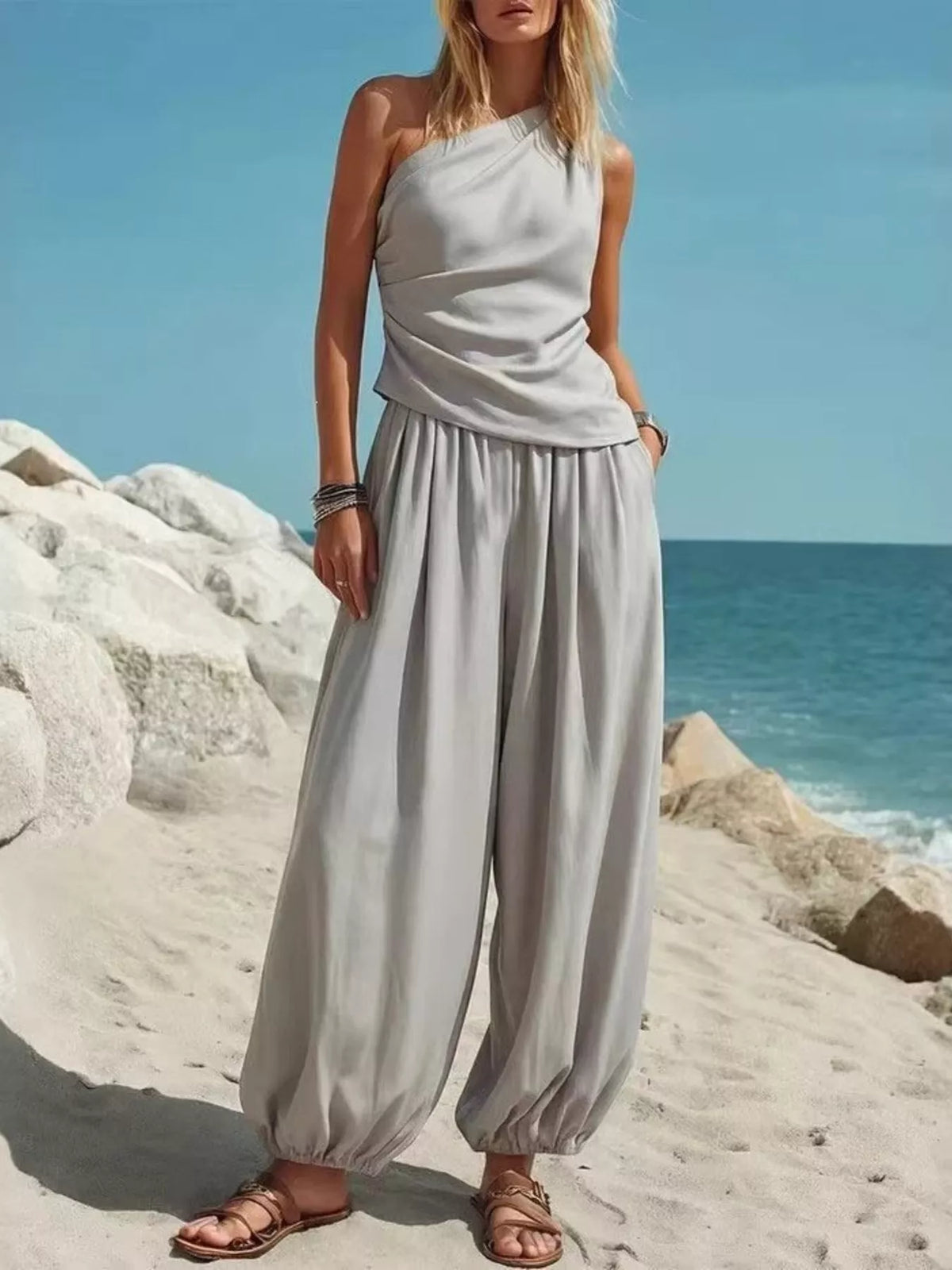 Plus size one-shoulder top and wide-leg pants set by Plush Fashion Hub, featuring a stylish, coordinated outfit with a modern fit.
