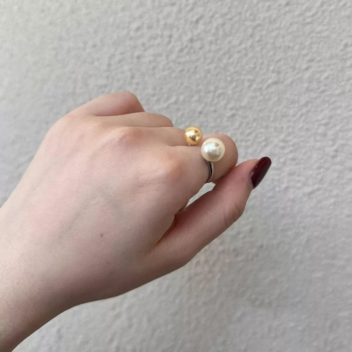 Double pearl open ring by Plush Fashion Hub featuring two elegant pearls on a sleek open band.