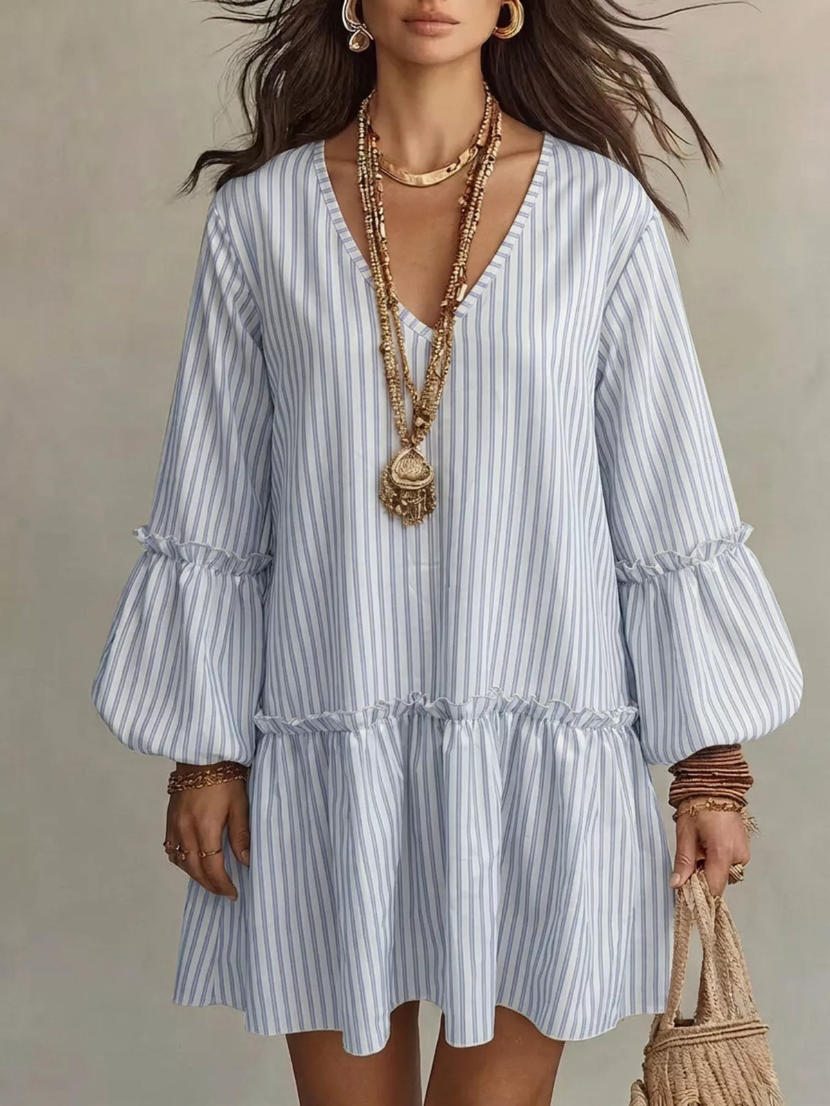 Plus size striped balloon sleeve mini dress by Trendsi, featuring a fitted bodice and playful, colorful horizontal stripes.