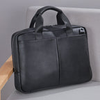 Genuine leather Pi-Mart men's large capacity briefcase with cowhide construction, horizontal design, and computer storage compartment.