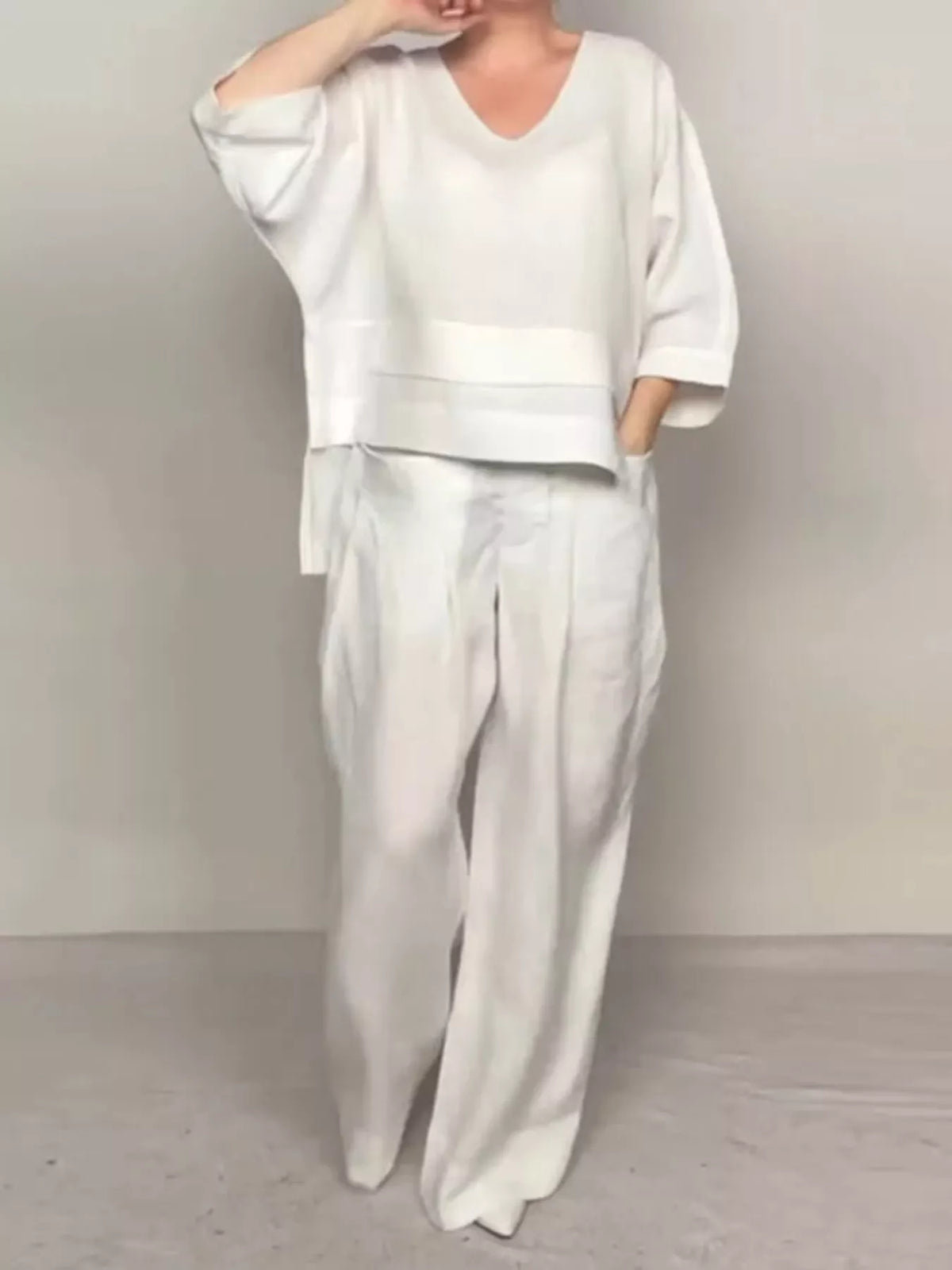 Plus size full V-neck long sleeve top and matching pants set by Trendsi, stylish and comfortable loungewear outfit.