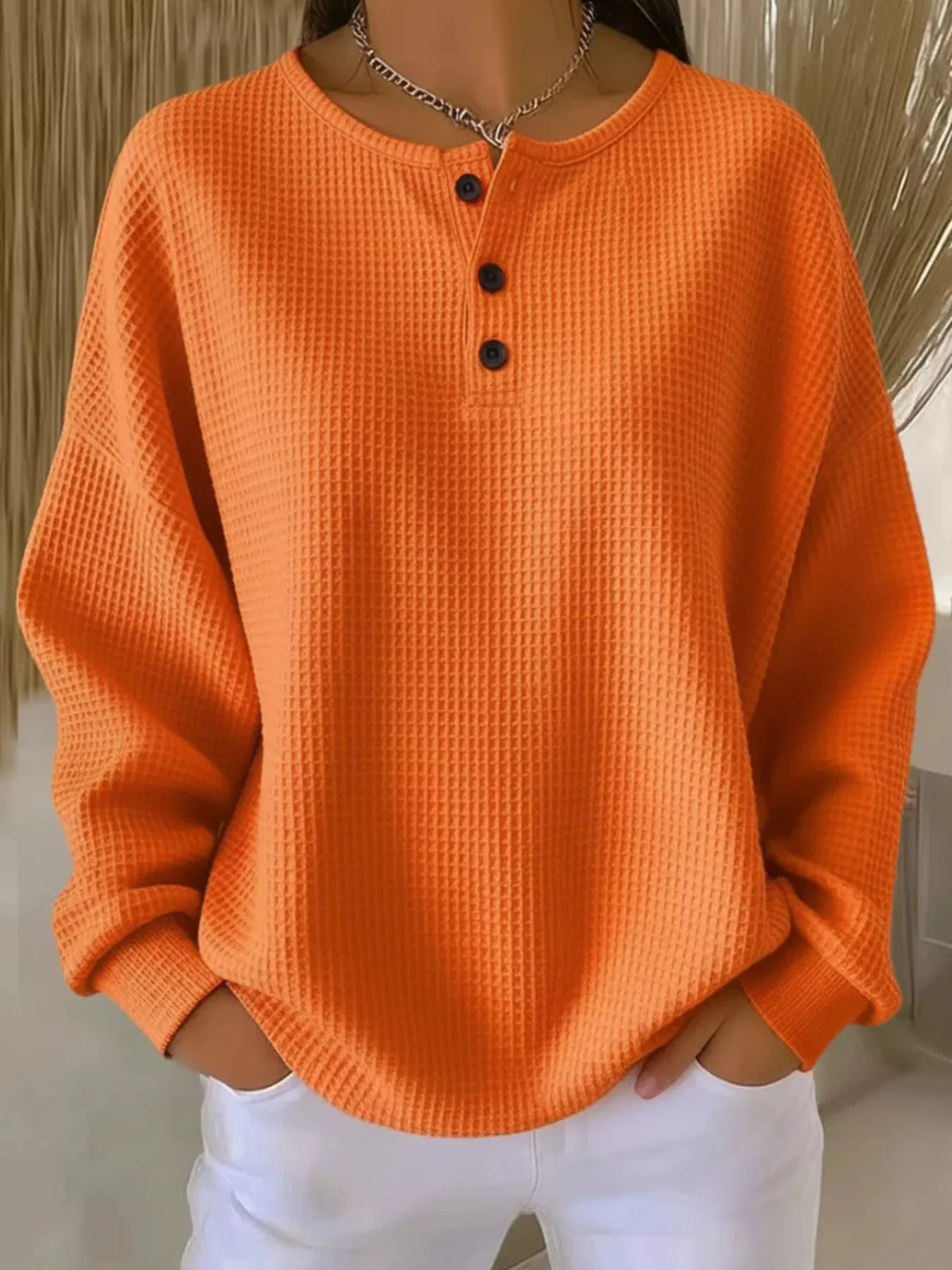 Plus size waffle knit top with button details from Trendsi, featuring a cozy, textured fabric and relaxed fit.