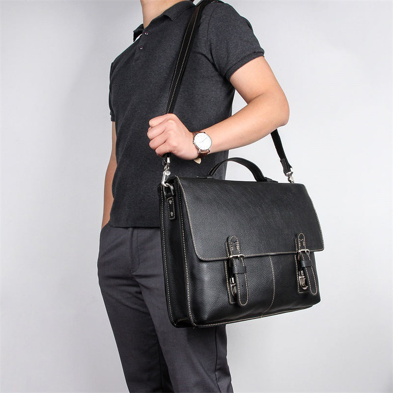 Men's Pi-Mart retro casual leather business briefcase with sturdy handles and multiple compartments for documents and essentials.