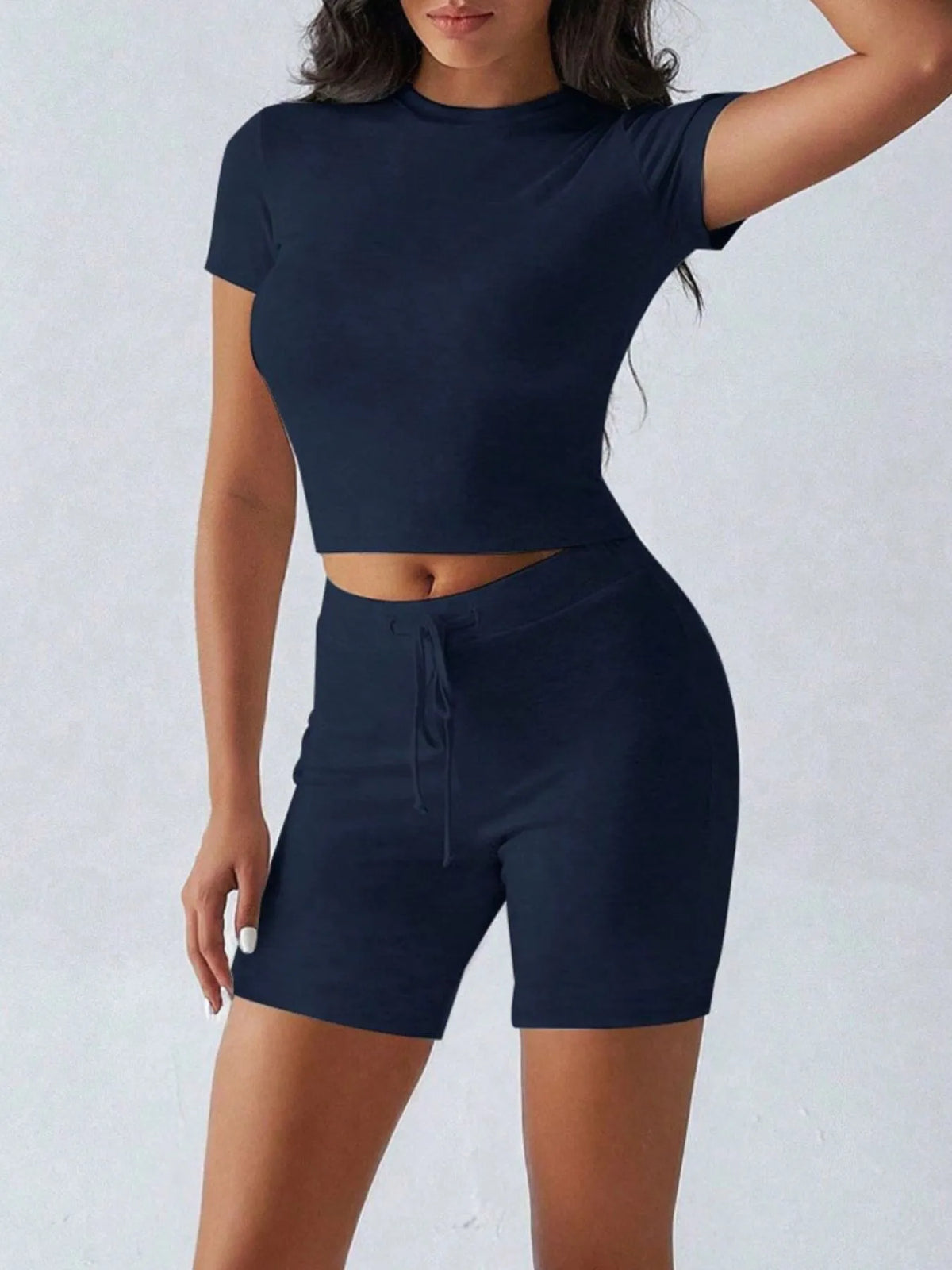 Plush Fashion Hub active wear set with round neck short sleeve top and matching shorts for comfortable workout or casual wear.