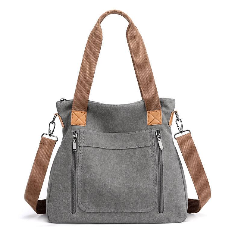 Women Large-capacity Canvas Casual Shoulder BagsBe stylish and organized with our Women's Large-capacity Canvas Casual Shoulder Bags. Made with soft canvas fabric, this bag is perfect for business or casual outingHandbagsPlush Fashions ShopPlush Fashion Shop