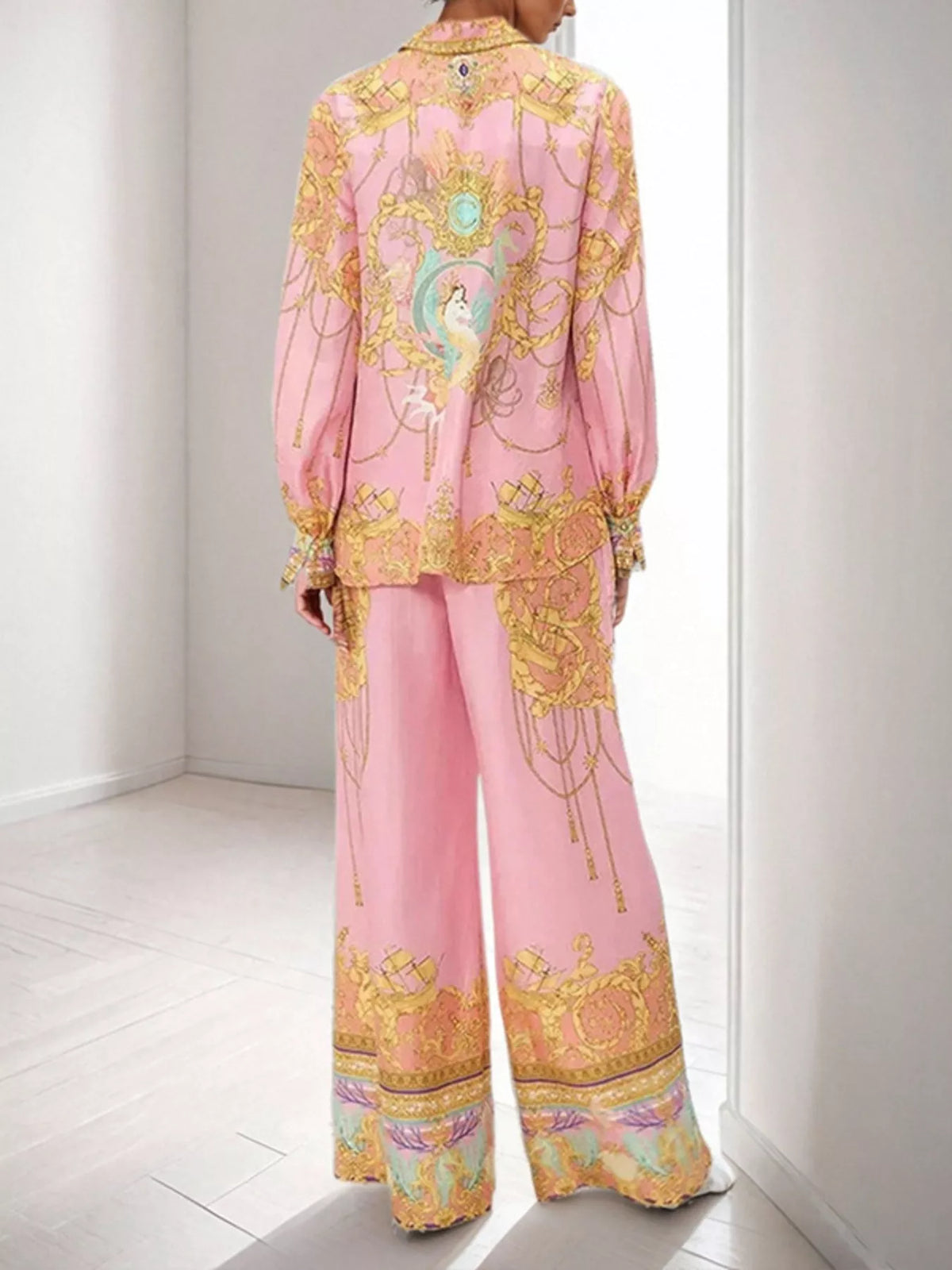 Women’s printed lantern sleeve top and pants lounge set by Plush Fashion Hub, featuring comfortable, stylish casual clothing.