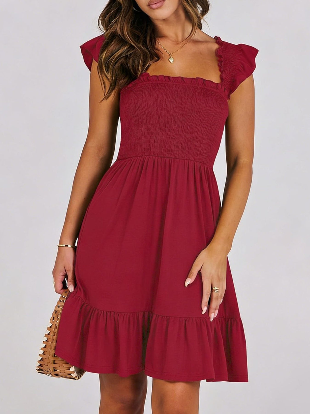 Women's lightweight summer dress by Plush Fashion Hub with smocked bodice and ruffled hem, perfect for casual warm-weather wear.