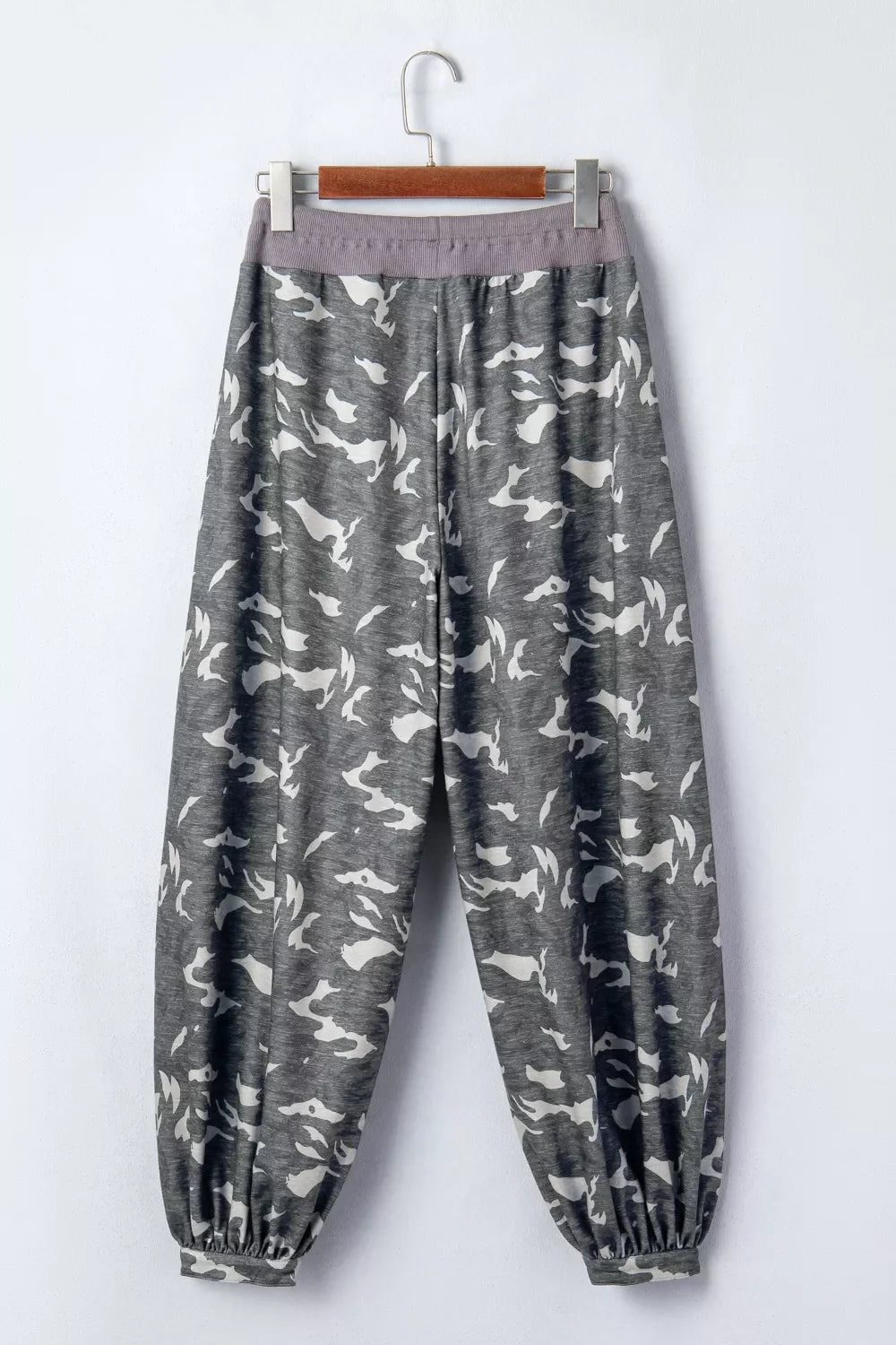 Multicolour camouflage cargo pants with drawstring contrast waistband and barrel style, designed by Plush Fashion Hub.