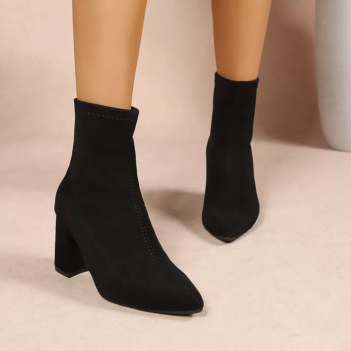 Women’s point toe block heel ankle boots by Trendsi, stylish black ankle boots with a pointed toe and chunky heel, perfect for fall.