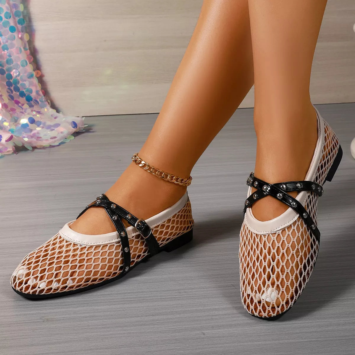 Plush Fashion Hub studded crisscross mesh slip-on shoes with pointed toes and decorative studs for a stylish, modern look.