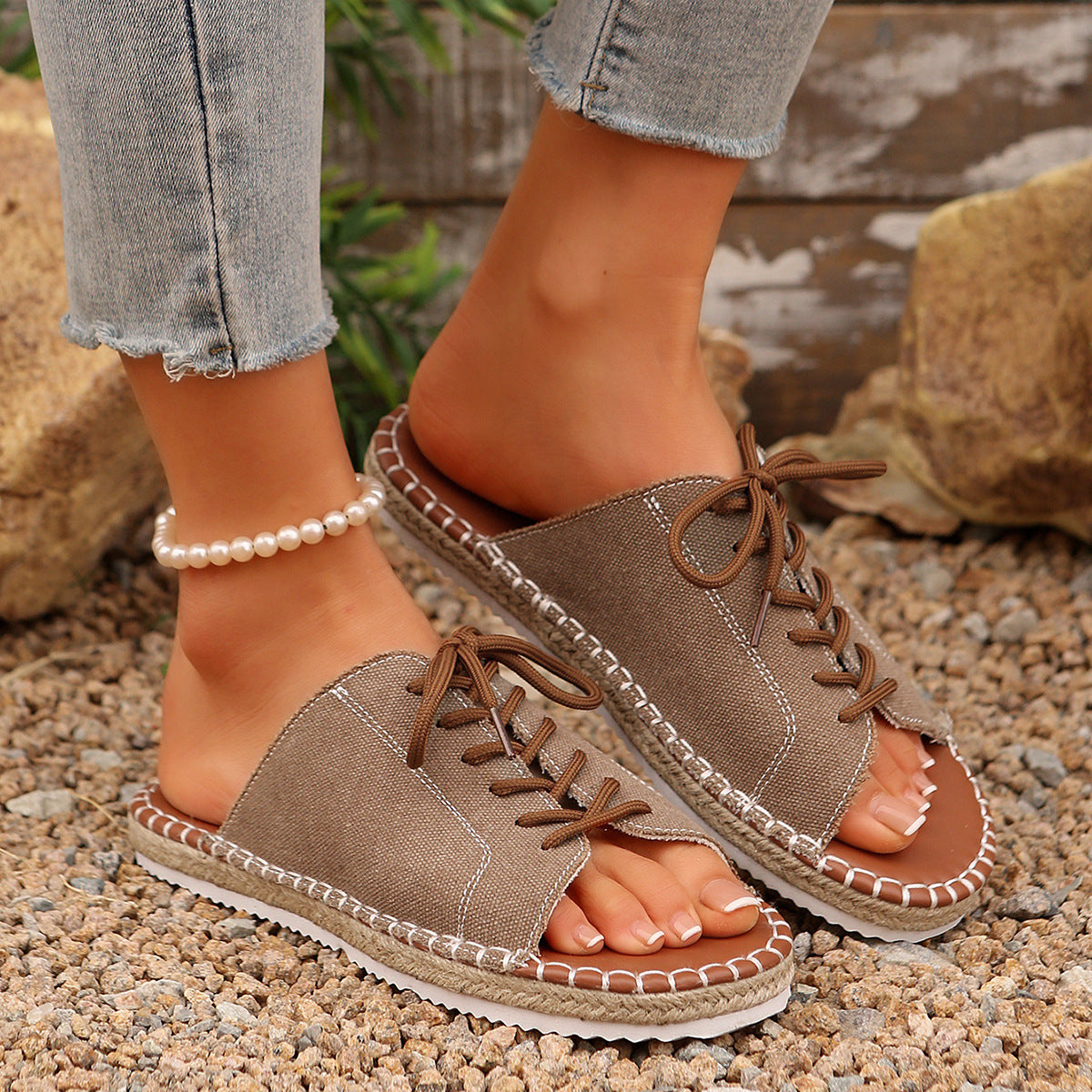 Women’s faux leather lace-up open toe flat sandals by Plush Fashion Hub, featuring a stylish design with open toes and lace-up detail.