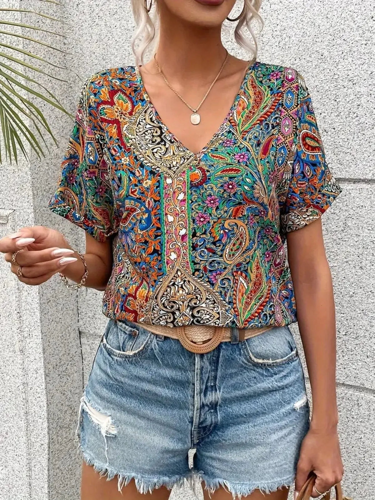 Plush Fashion Hub bohemian paisley V-neck short sleeve T-shirt with vibrant print and relaxed fit, ideal for casual wear.