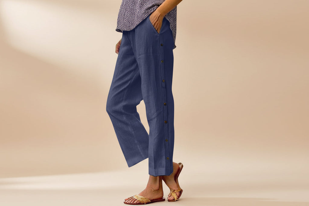 Casual FitiqueFit cropped pants with decorative buttons along side seams, featuring a stylish and comfortable design.