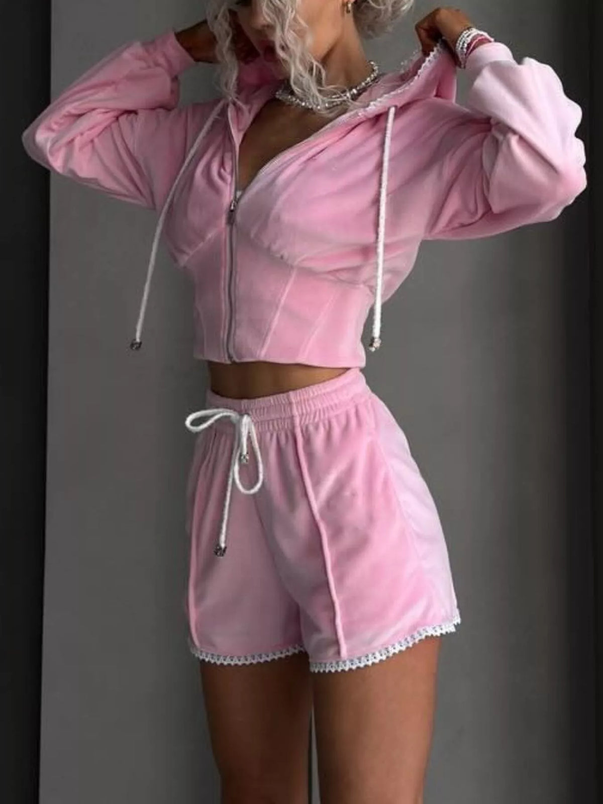 Plush Fashion Hub zip-up hooded outerwear and shorts set, soft fabric, front pockets, and hood, casual loungewear for women.