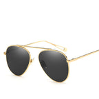 Plush Fashion Hub pilot women's sunglasses with vintage aviation style, featuring classic frame and tinted lenses.