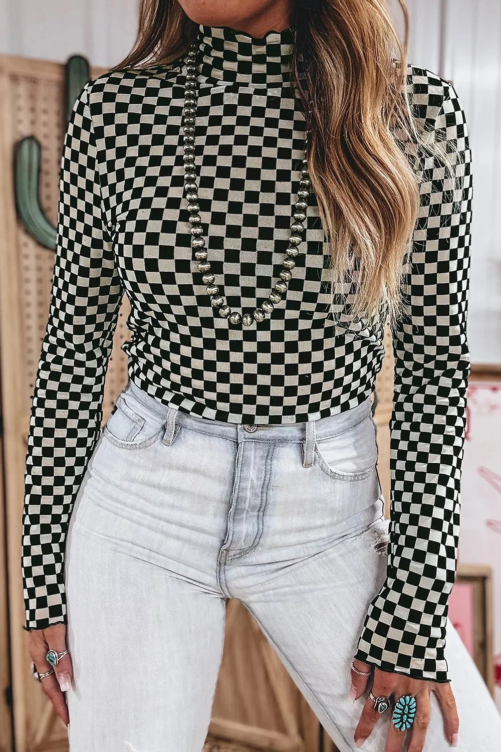 Plaid stand neck long sleeve mesh top by Plush Fashion Hub, featuring a stylish plaid pattern and mesh fabric detail.