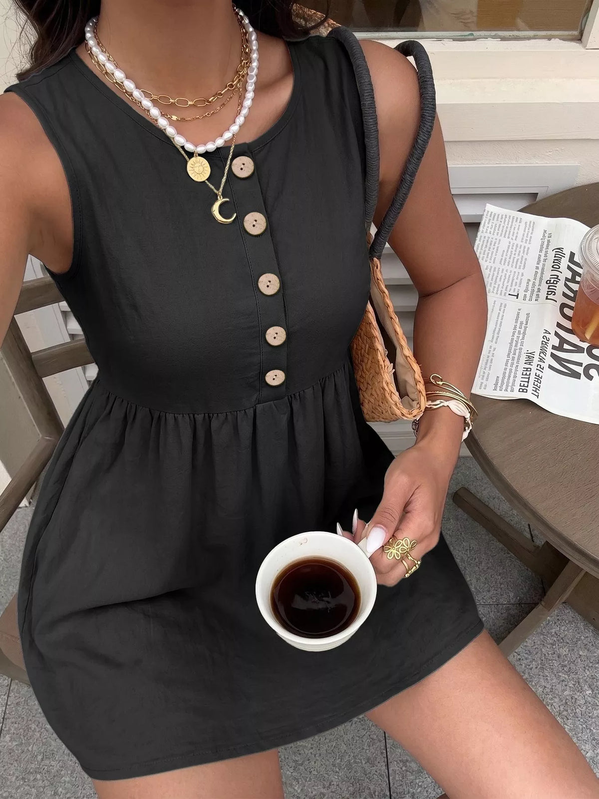 Sleeveless button-front A-line dress by Plush Fashion Hub, featuring a fitted bodice and flowing skirt in a stylish design.