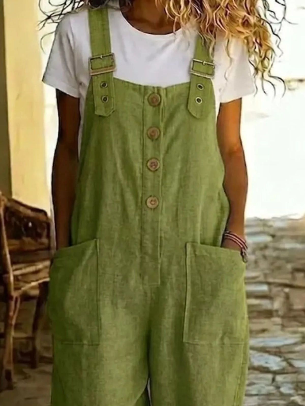 Casual button-front wide-leg overalls by Plush Fashion Hub, featuring adjustable straps and relaxed fit in durable denim fabric.