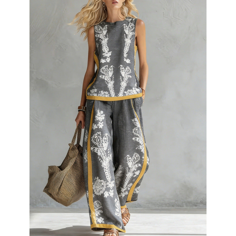 Printed retro sleeveless top and wide-leg pants set by FitiqueFit, featuring vibrant print designs and a stylish two-piece look.