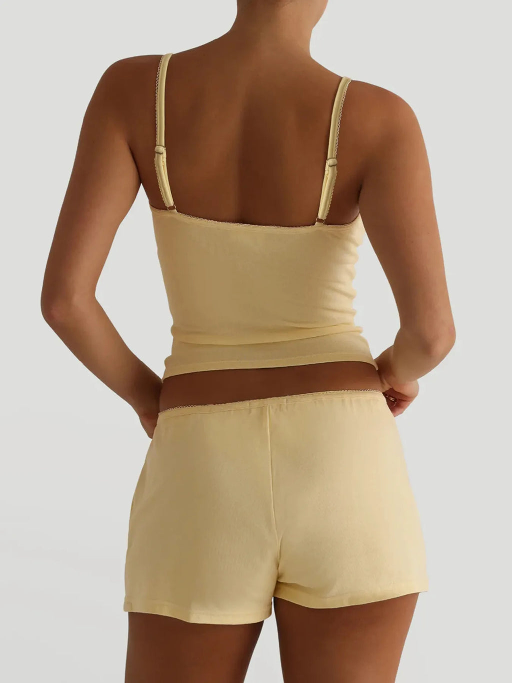Trendsi active wear V-neck cami and matching shorts set, lightweight fabric, perfect for workout or casual wear.