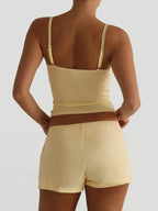 Trendsi active wear V-neck cami and matching shorts set, lightweight fabric, perfect for workout or casual wear.