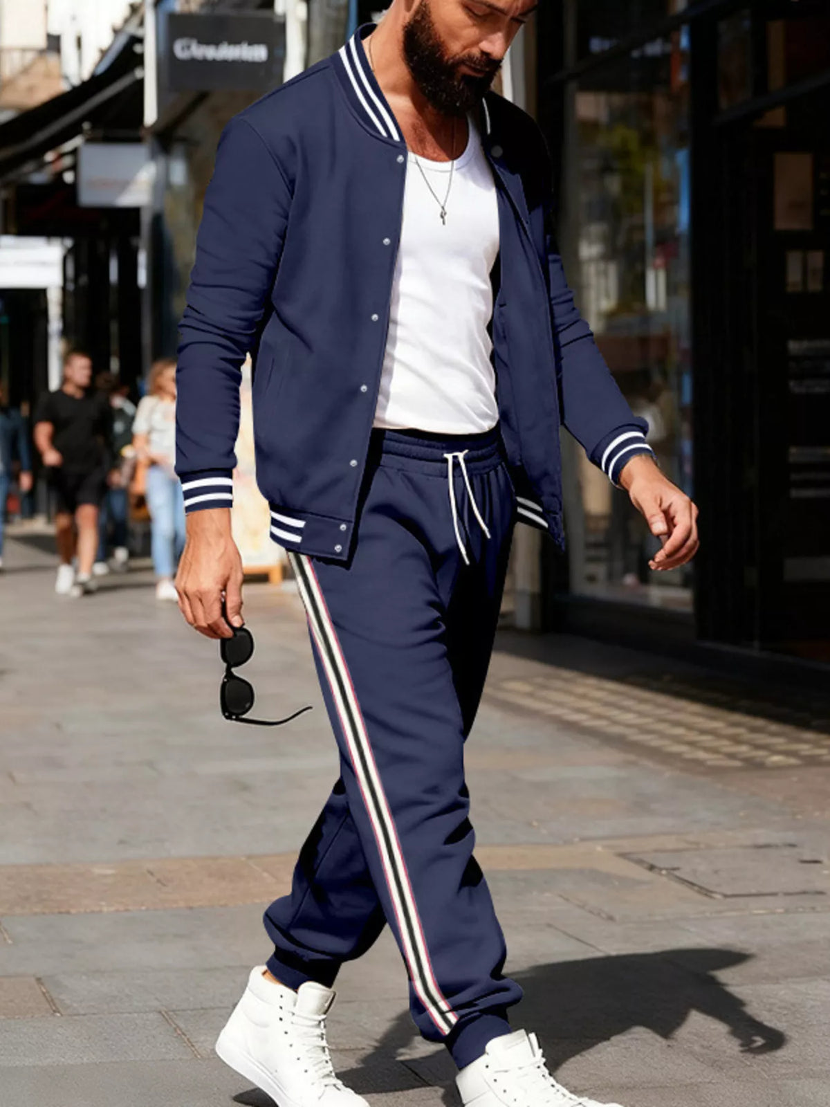 Men's plus size striped snap-down top and matching pants set by Plush Fashion Hub, casual wear with bold stripe pattern.